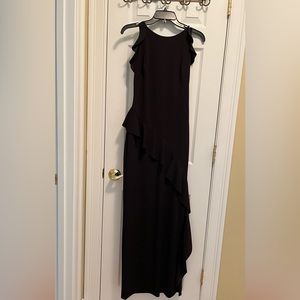 Black sleeveless long dress with ruffles